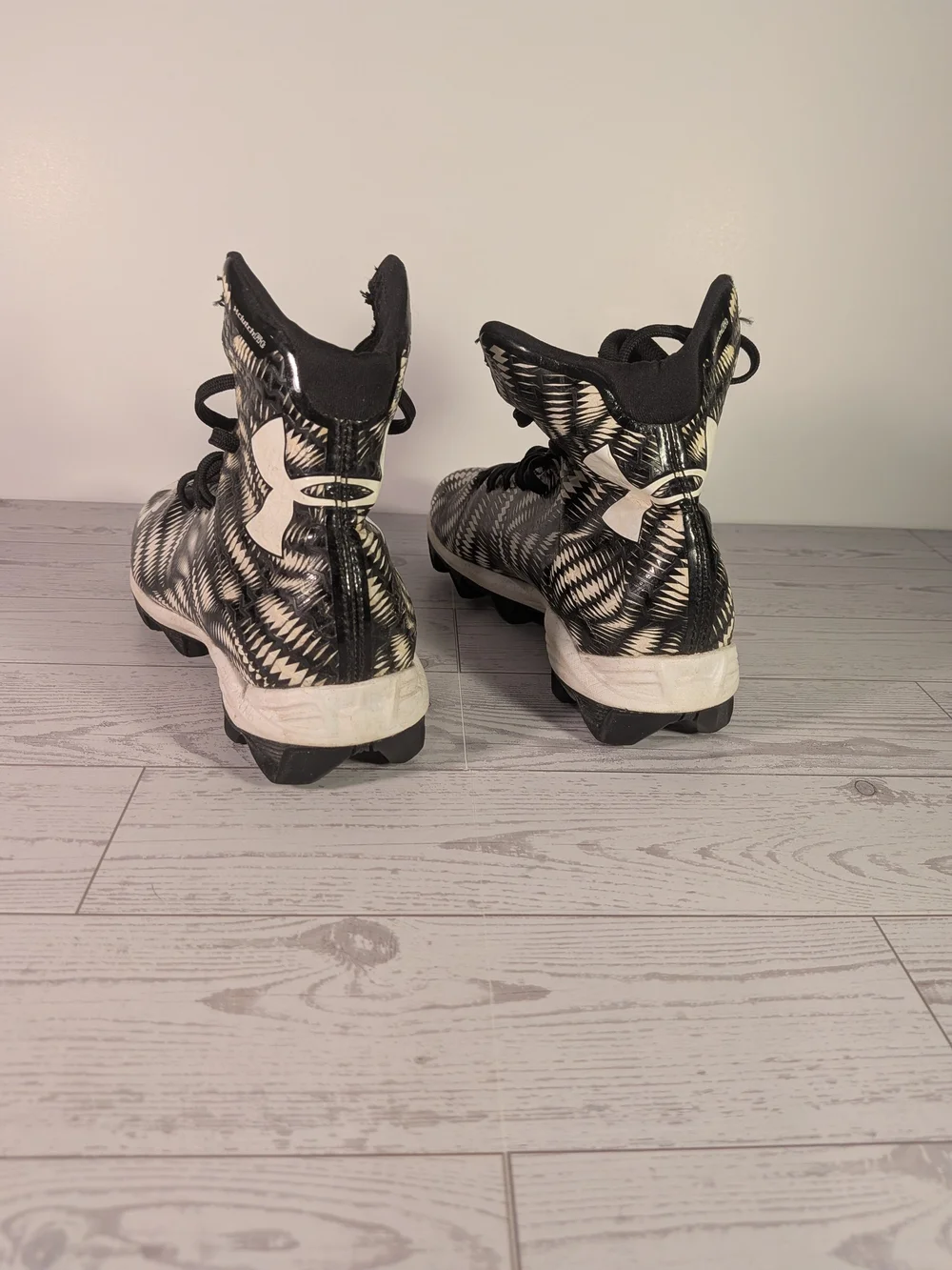 Under Armour Kids' Black & White High-Top Cleats 2Y